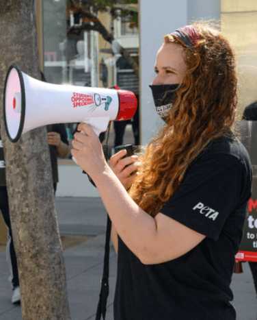 Activist with megaphone at demo